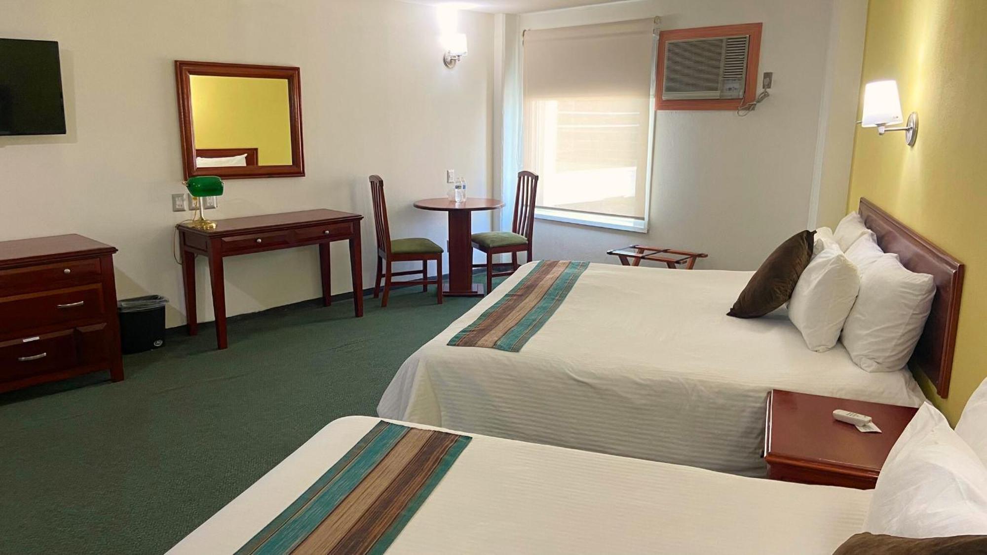 Hotel Enterprise Inn Poliforum Леон Экстерьер фото